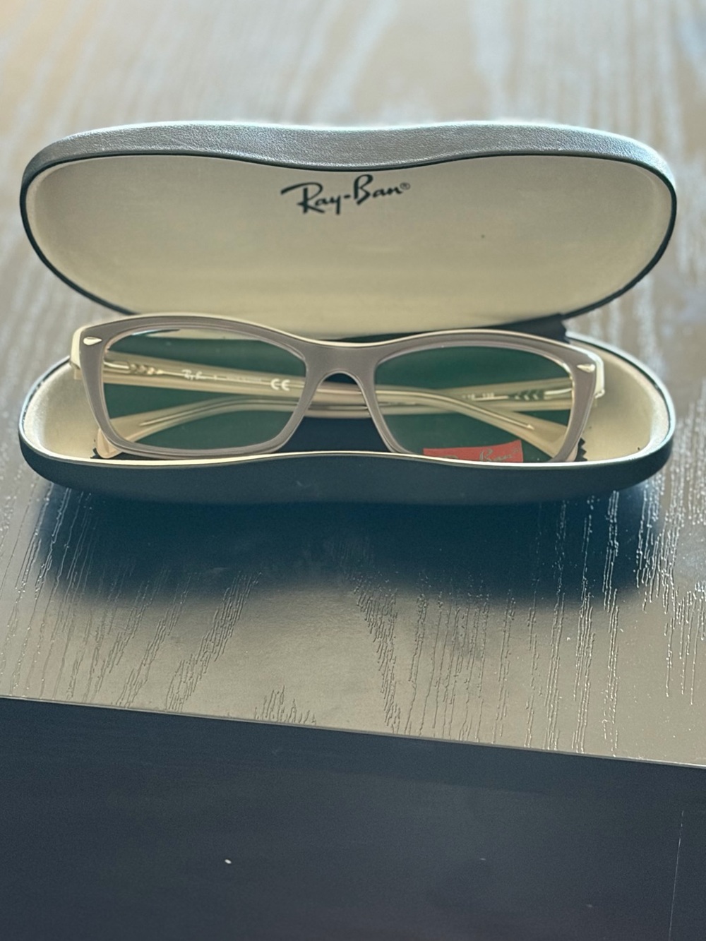 Ray-Ban Light Gray Rectangular Eyeglasses with Case

Must Replace Lenses